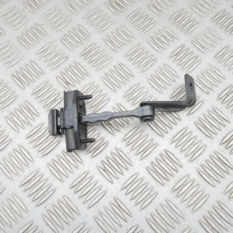 Front door check strap stopper – Tesla Model Y (2020-)