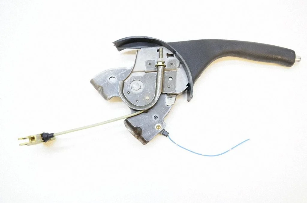 Hand brake release handle