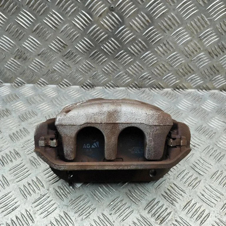 Front brake caliper 1EA615105