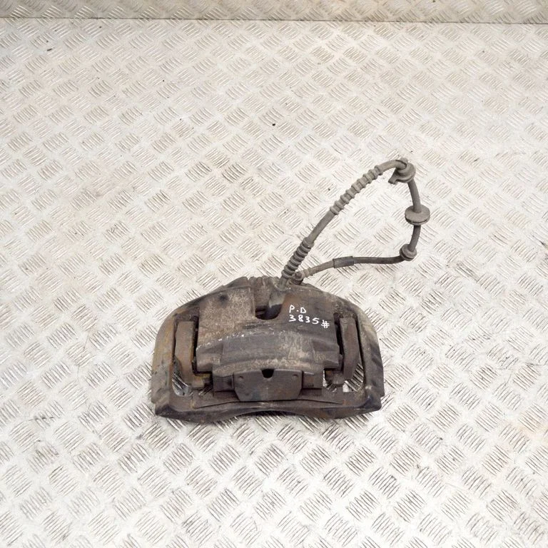 Front brake caliper – right