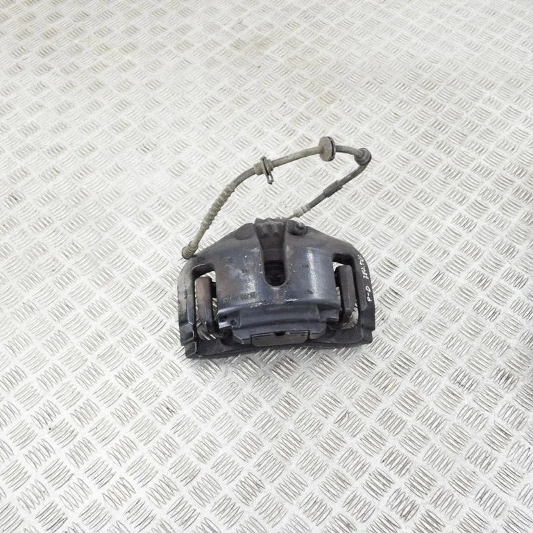 Front brake caliper – right