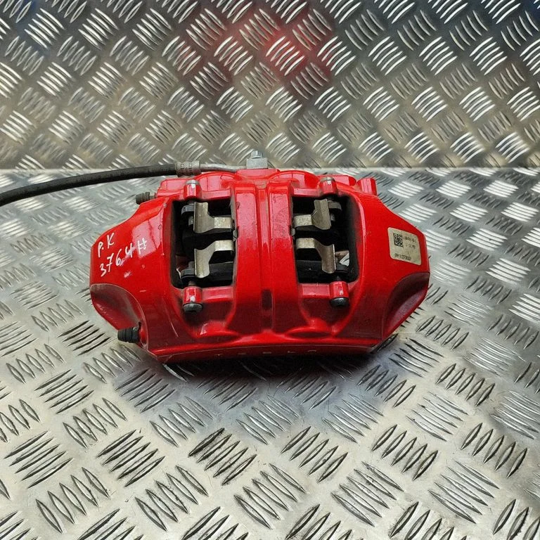 Front brake caliper 104464100D
