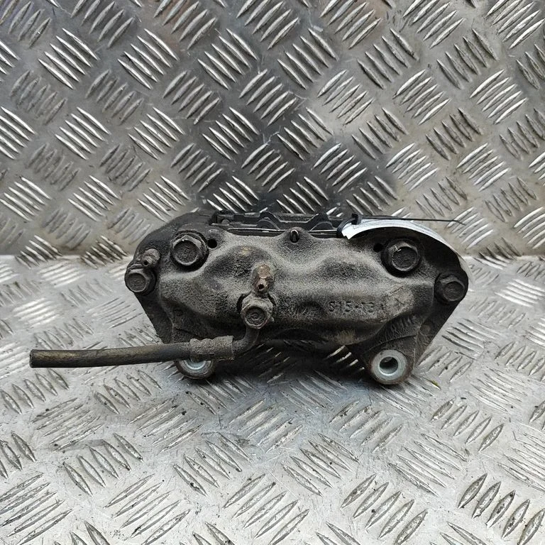 Front brake caliper 477306009084