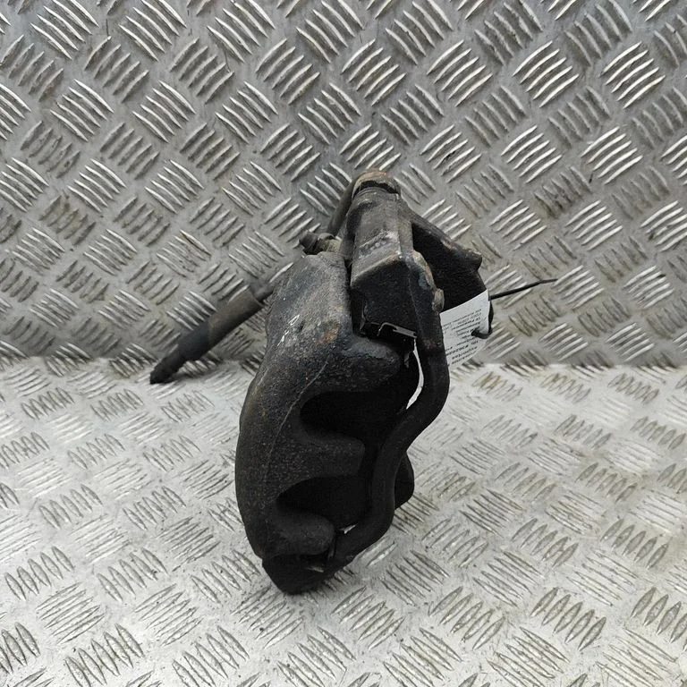 Front brake caliper BK212B302AA