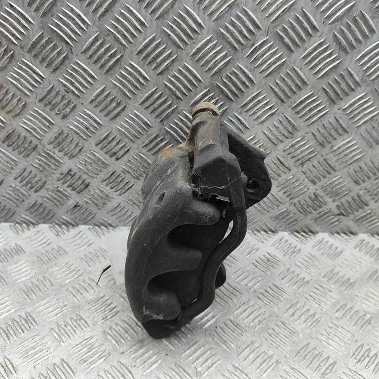Front brake caliper BK212B294AA
