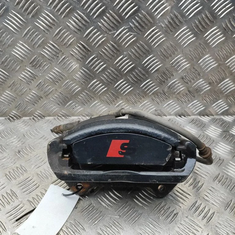 Front brake caliper 8V0615123E