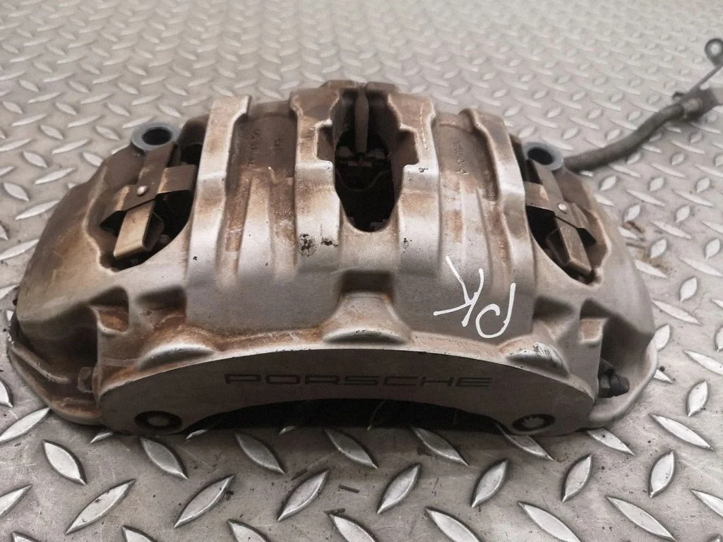 Front brake caliper – left