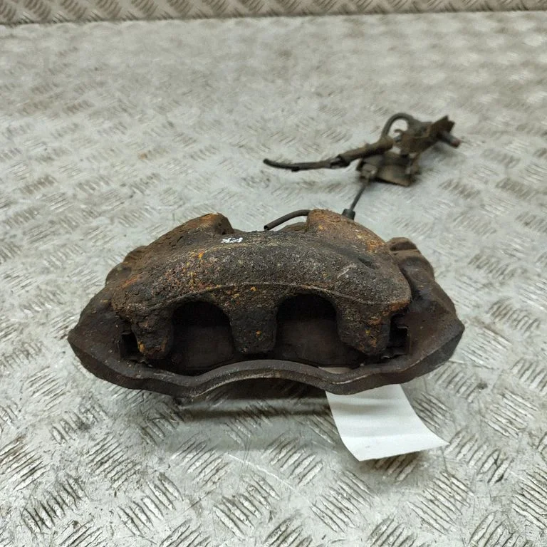 Front brake caliper BK212B302BA