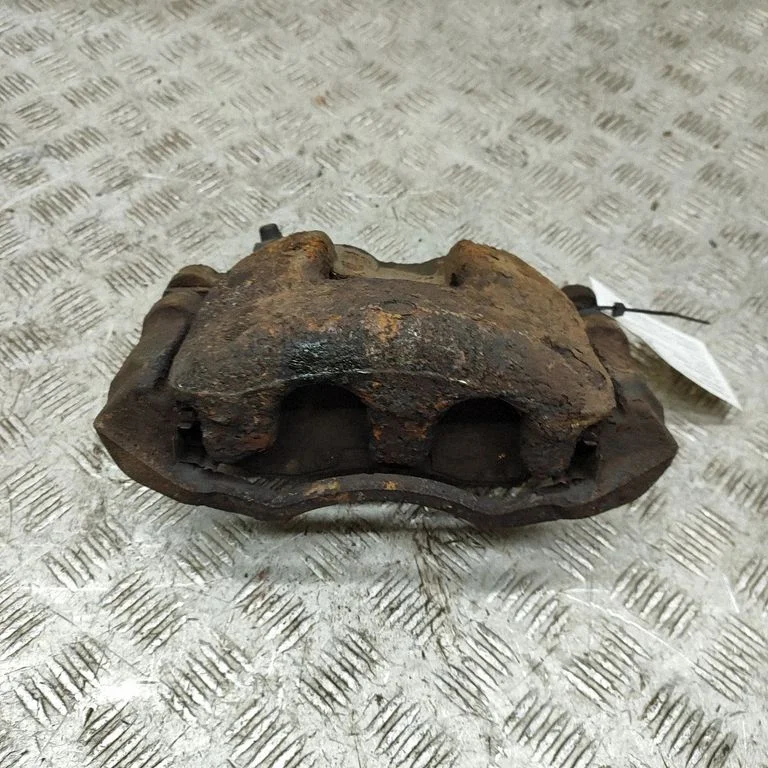 Front brake caliper BK212B294BA