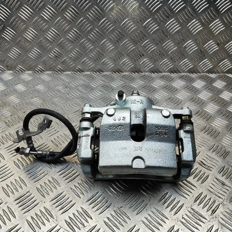 Front brake caliper 58130AO500