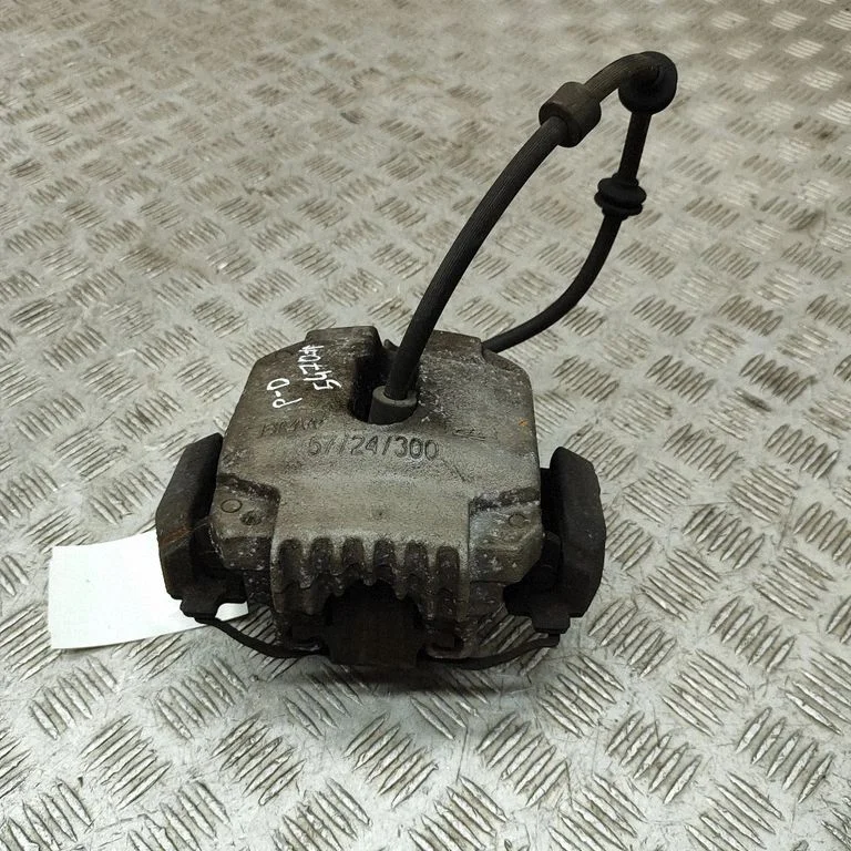Front brake caliper 6769092
