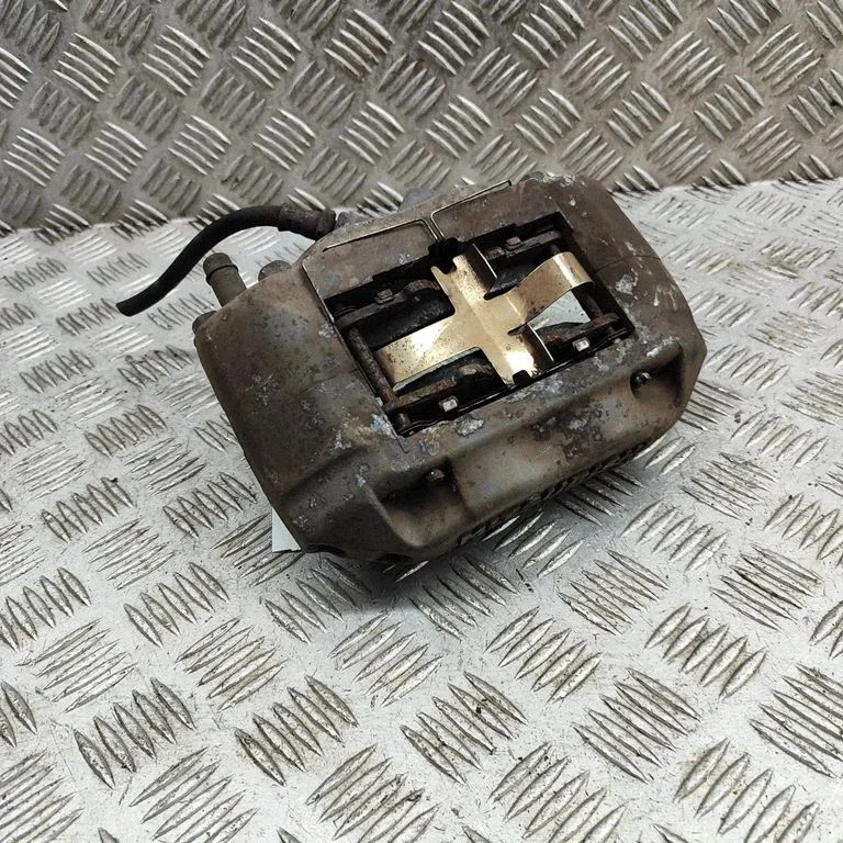 Front brake caliper MB928037