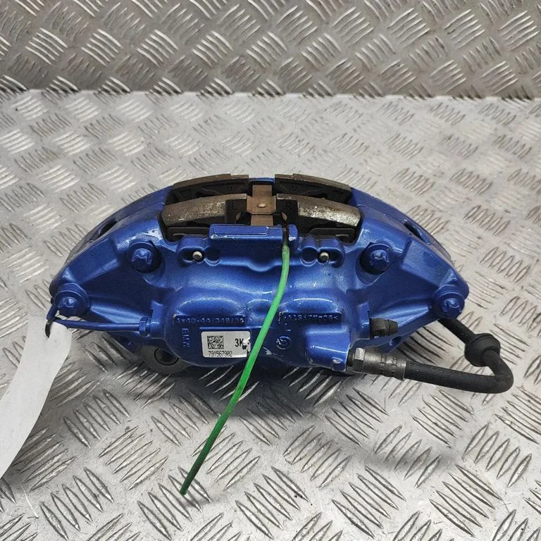 Front brake caliper 7915679