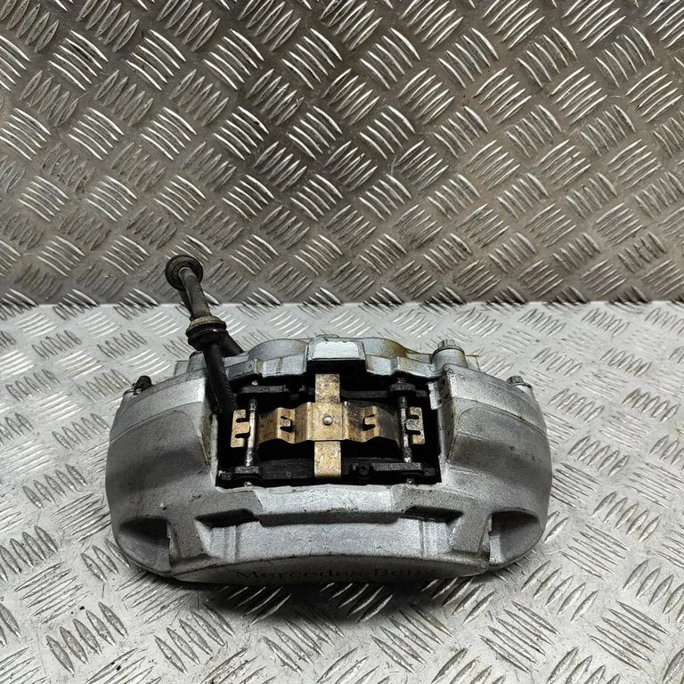 Front brake caliper A0114219598