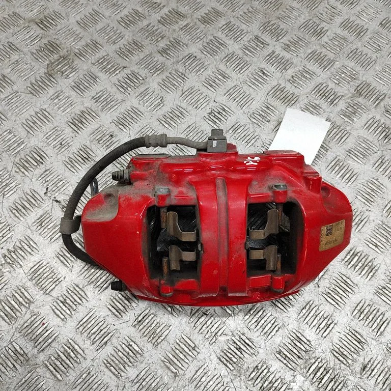 Front brake caliper 104464100F