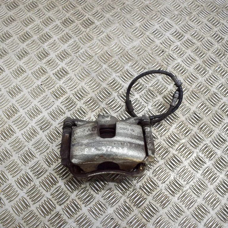 Front brake caliper – left