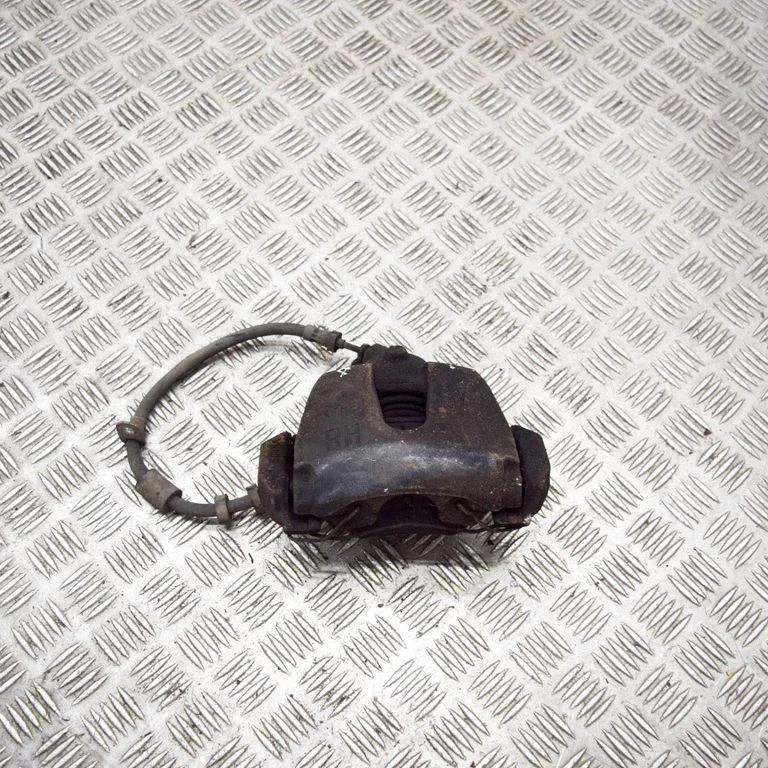 Front brake caliper – right