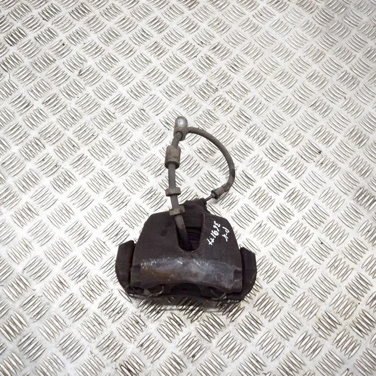 Front brake caliper – left