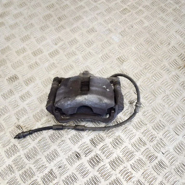 Front brake caliper – left