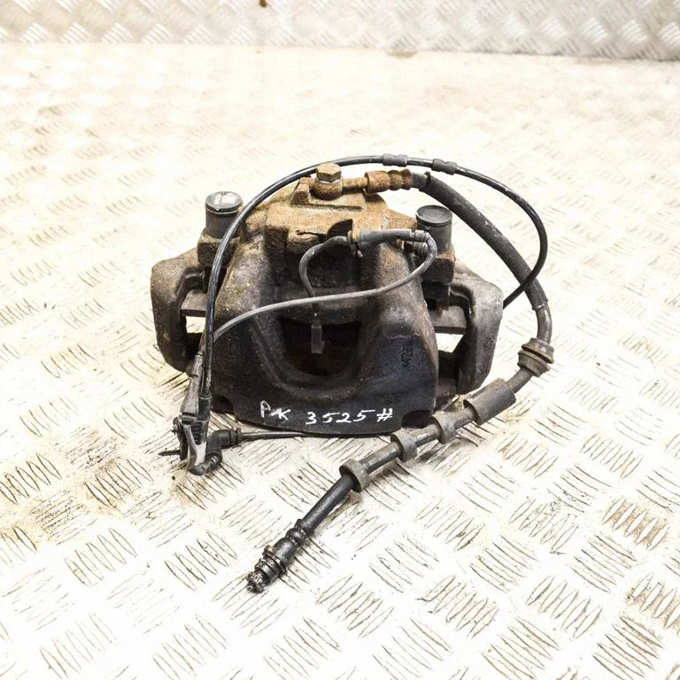 Front brake caliper – left