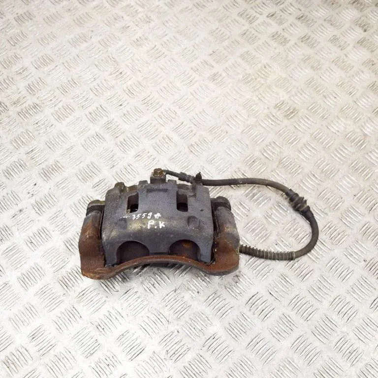 Front brake caliper – left