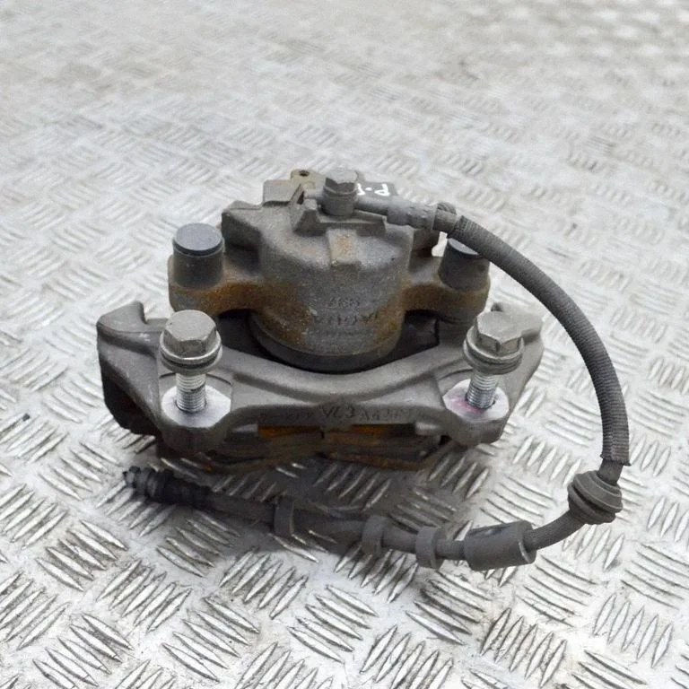 Front brake caliper – right