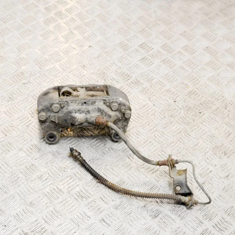 Front brake caliper – right