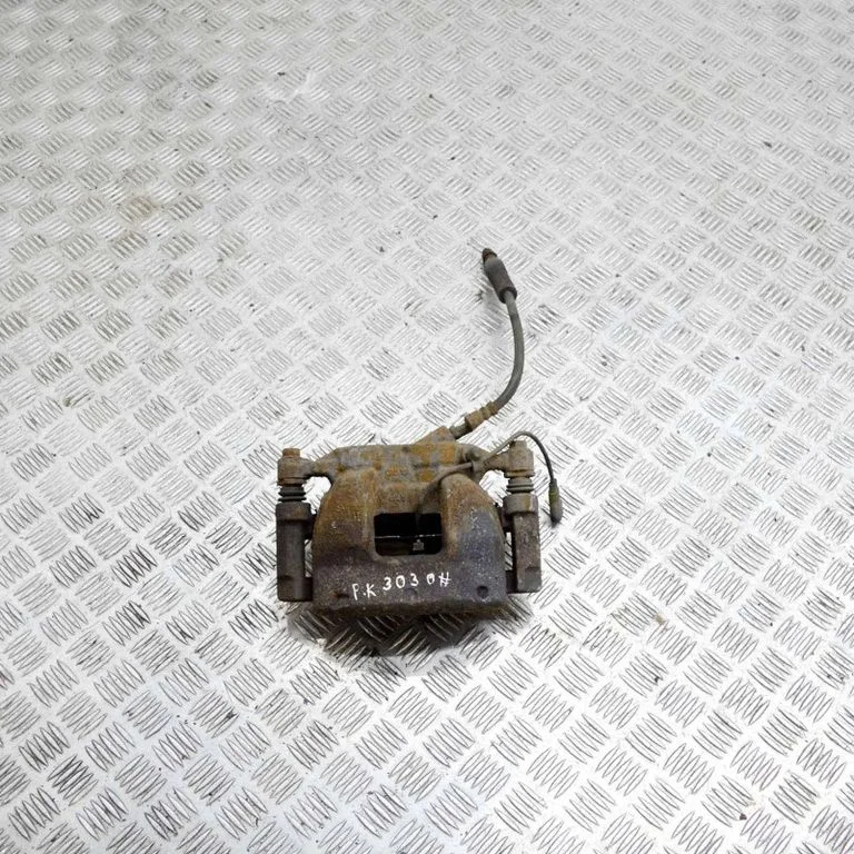 Front brake caliper – left