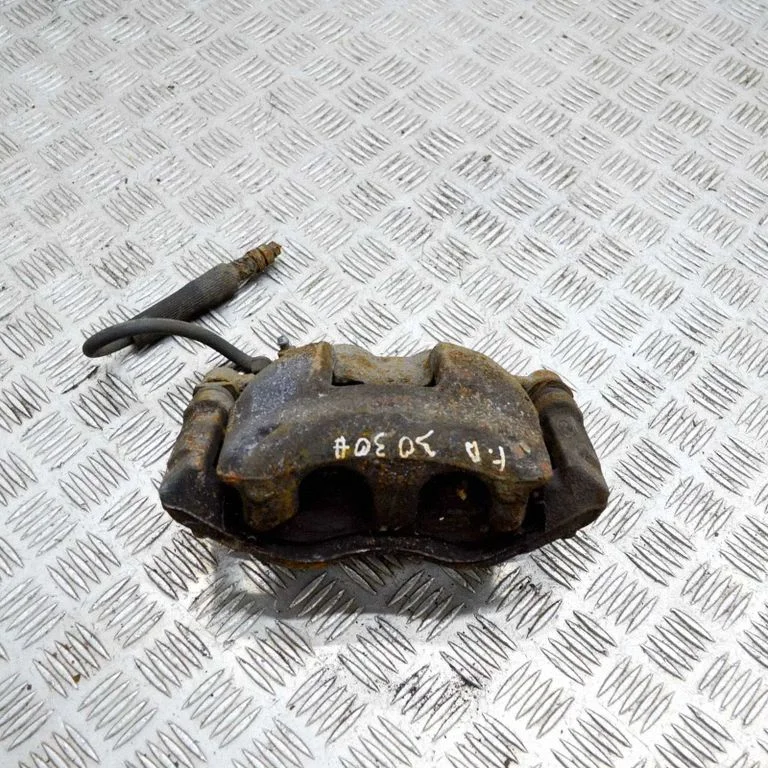 Front brake caliper – right