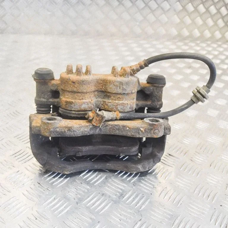 Front brake caliper – right