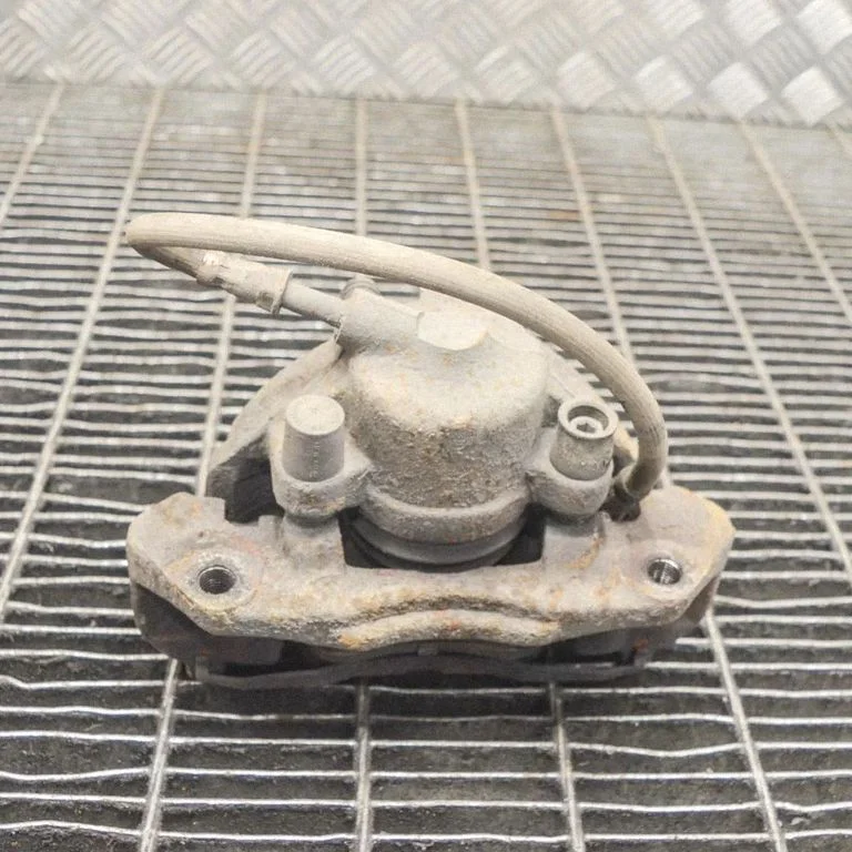 Front brake caliper – right