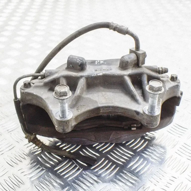 Front brake caliper – left
