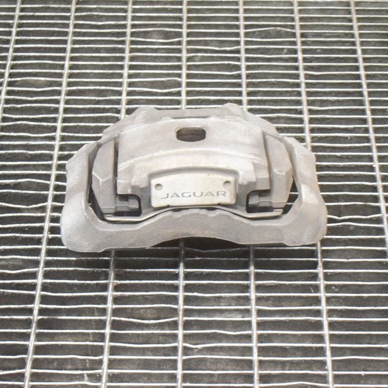 Front brake caliper – left