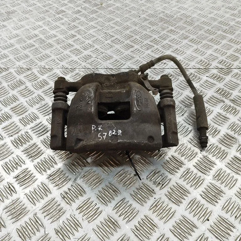 Front brake caliper BK212B302AA