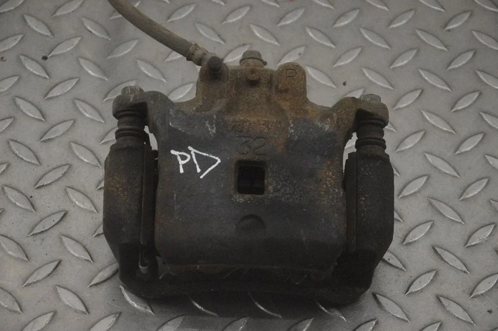 Front brake caliper – right