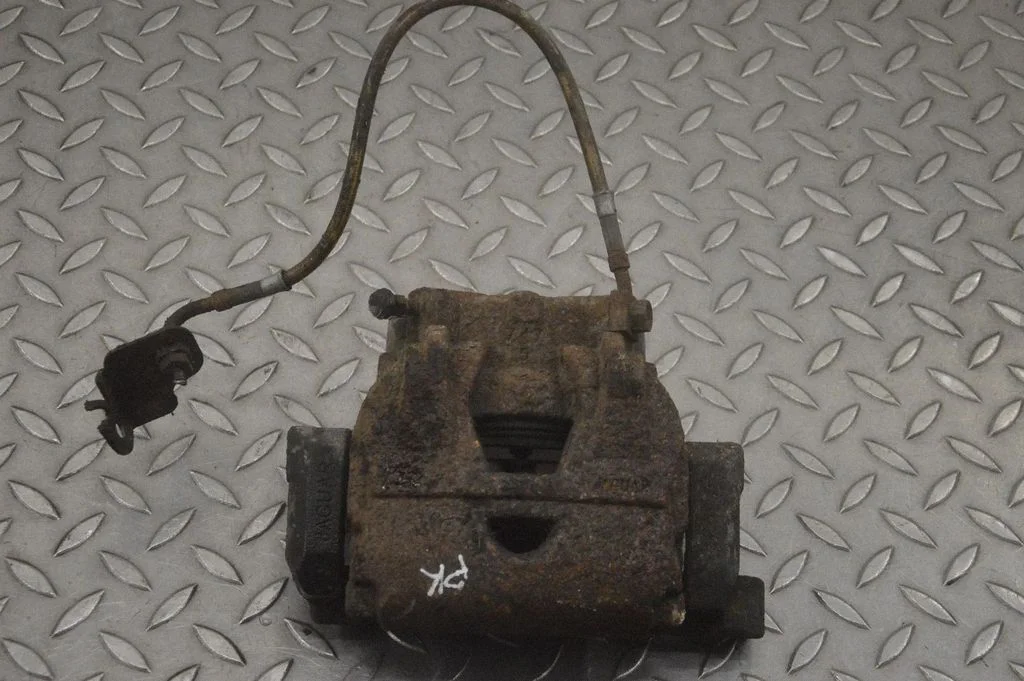 Front brake caliper – left