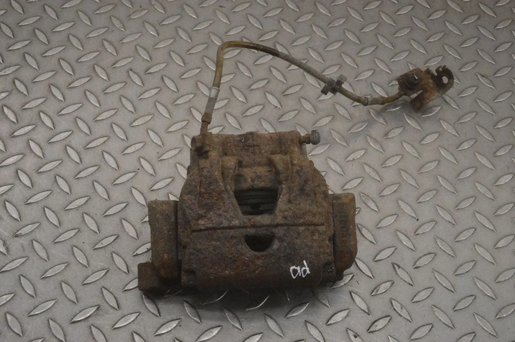 Front brake caliper – right