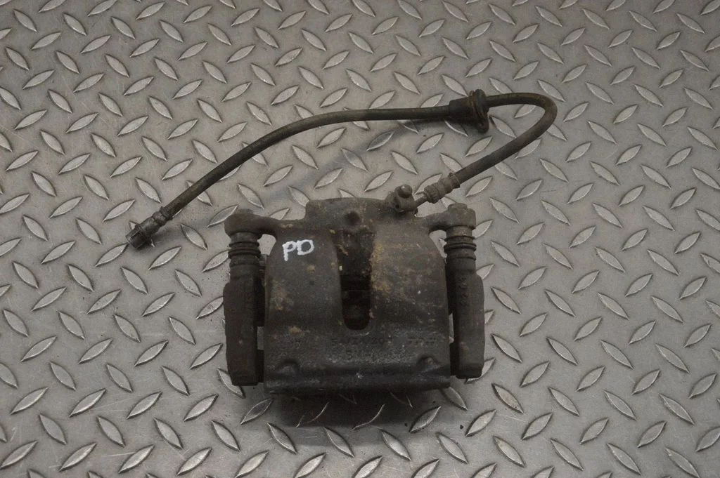 Front brake caliper – right
