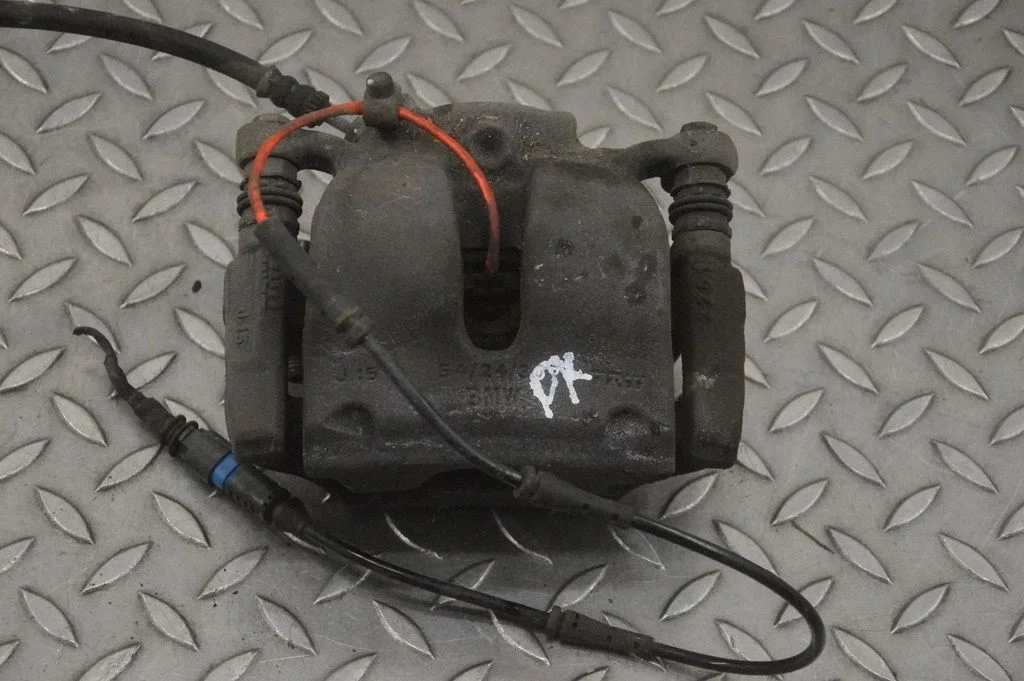 Front brake caliper – left