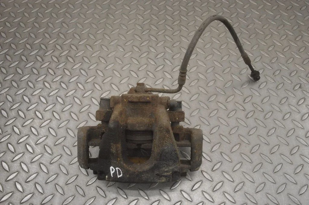 Front brake caliper – right