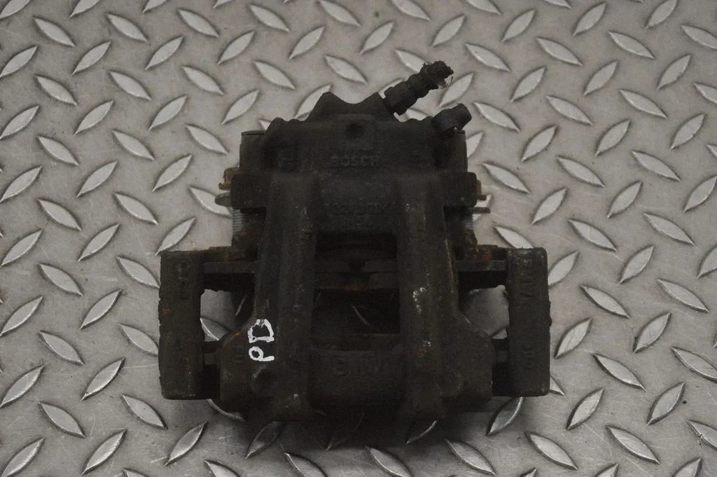 Front brake caliper – right
