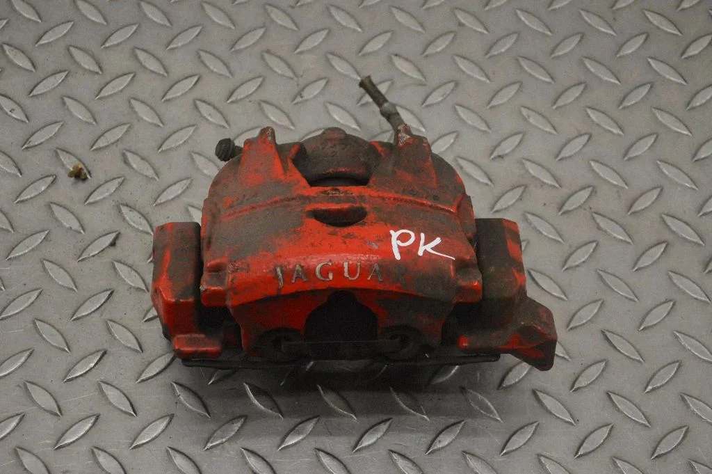 Front brake caliper – left