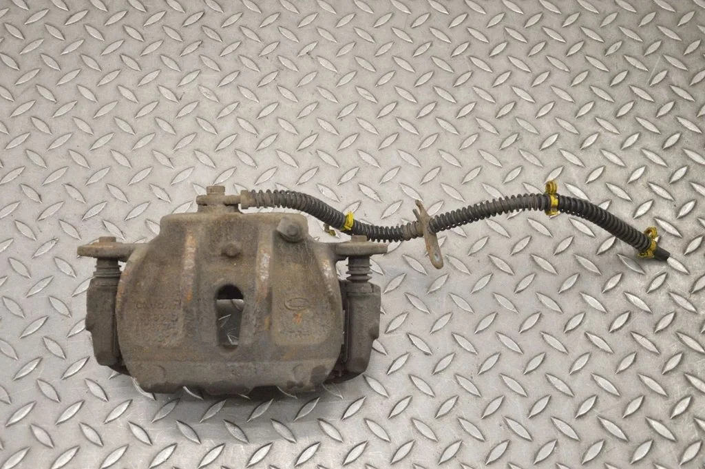 Front brake caliper – right