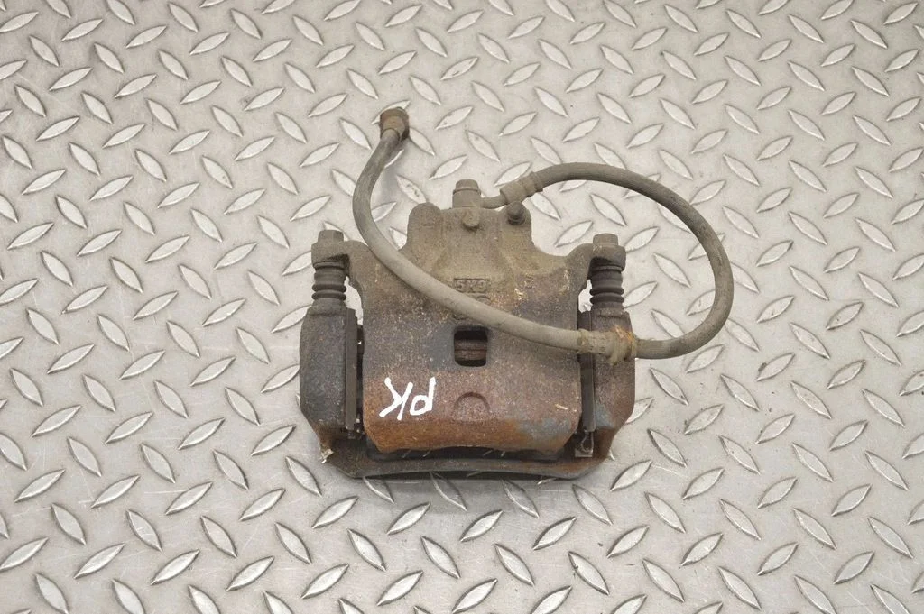 Front brake caliper – left