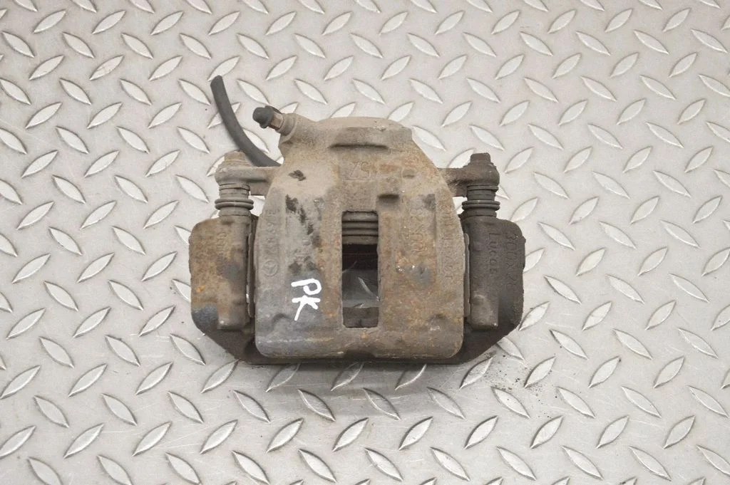 Front brake caliper – left