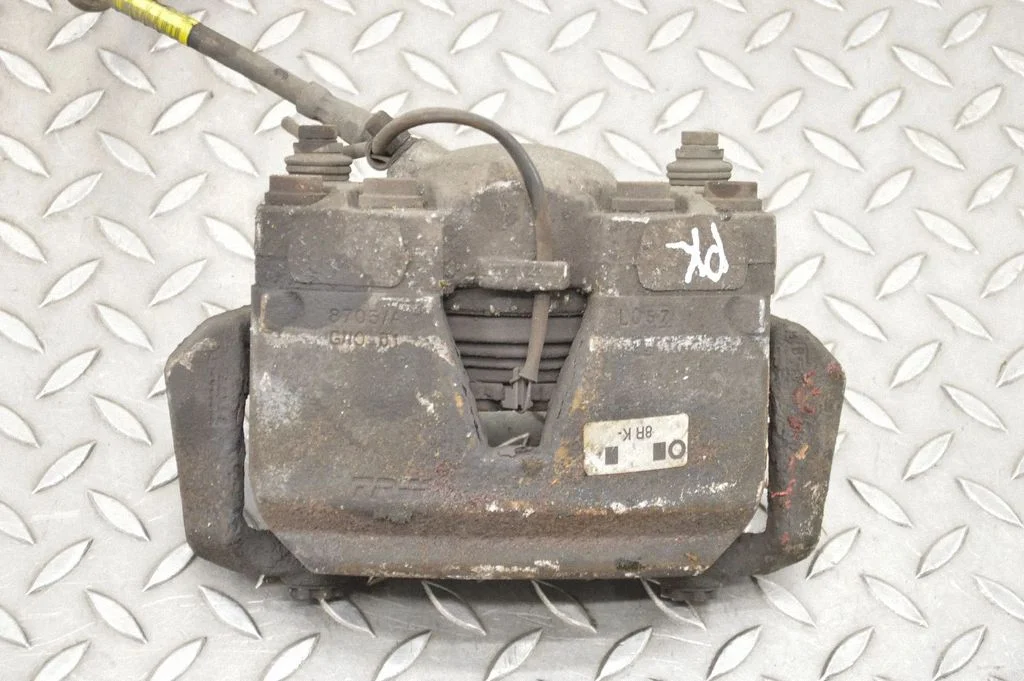 Front brake caliper – left
