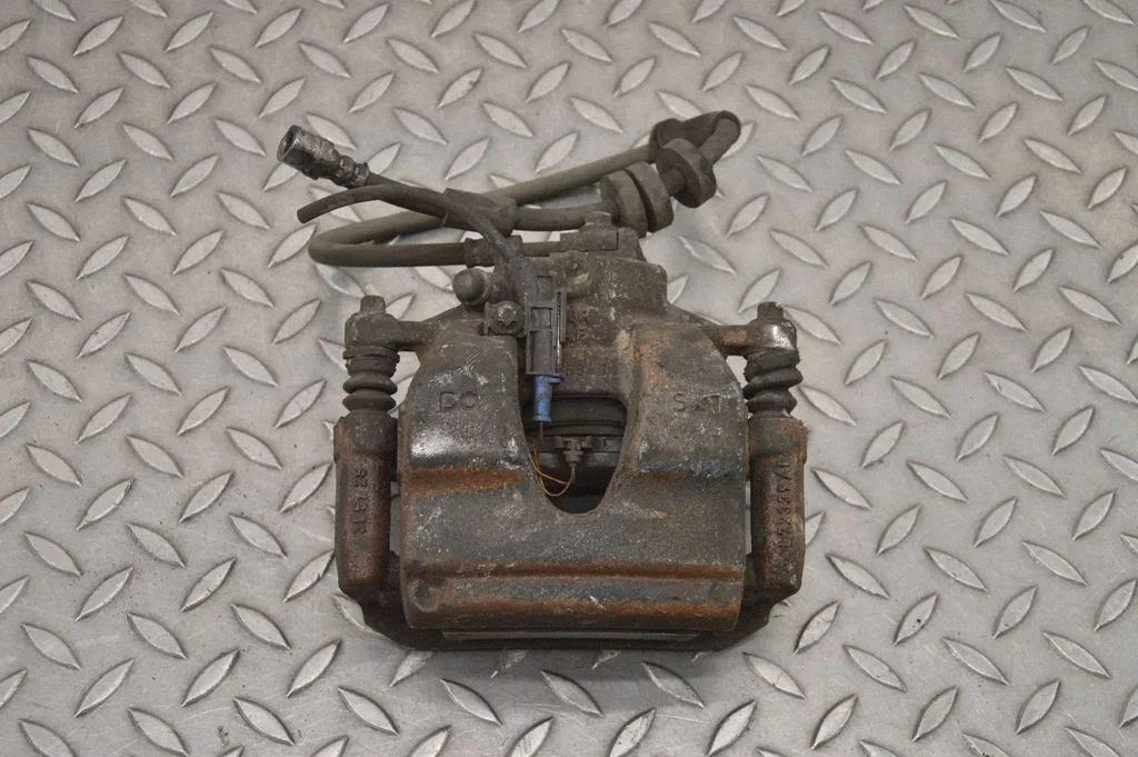 Front brake caliper – right