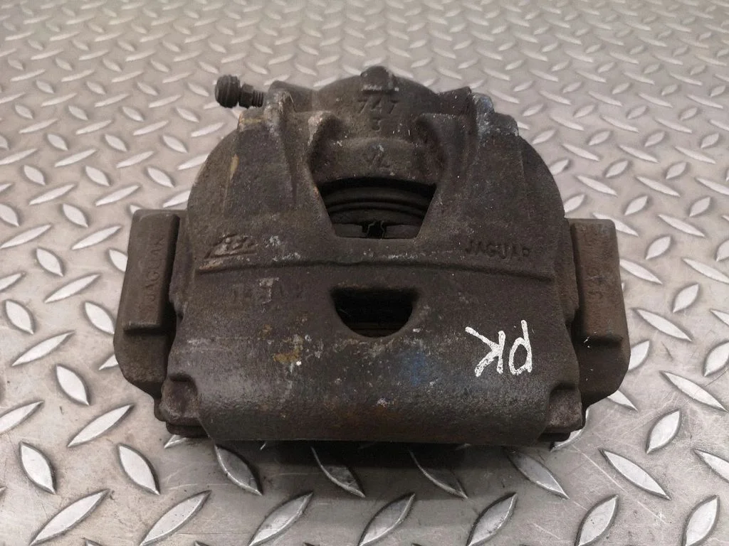 Front brake caliper – left