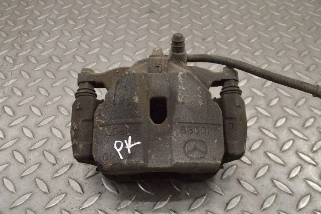 Front brake caliper – left