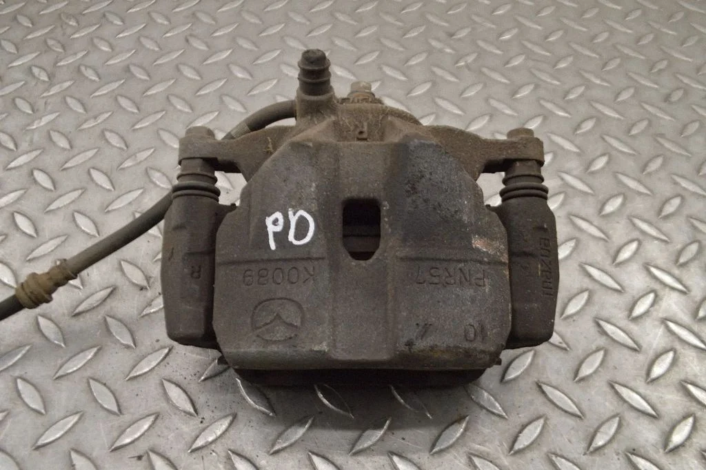 Front brake caliper – right